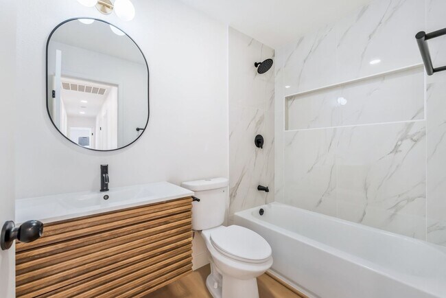 Building Photo - Modern Designer Remodel with Stylish Finishes & Spacious Outdoor Living!