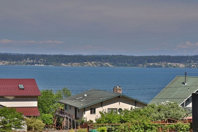 Building Photo - Stunning View With This  Cape Cod Cottage ...