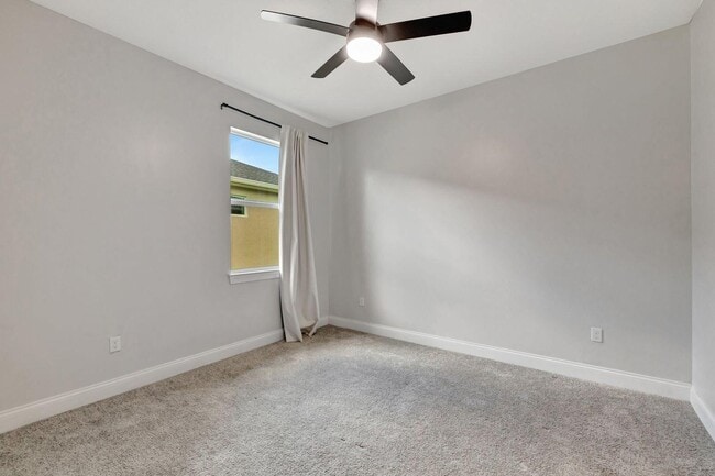 Building Photo - 8606 Dahlia Cir