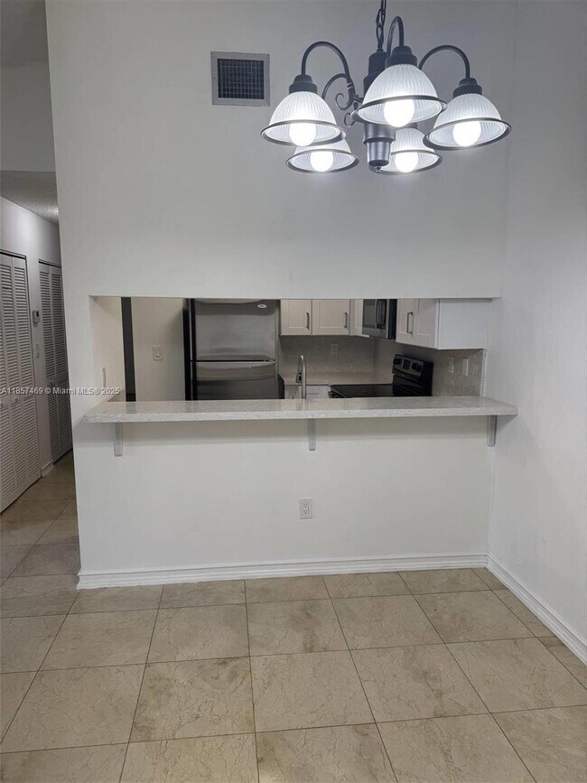 Building Photo - 8999 SW 123rd Ct