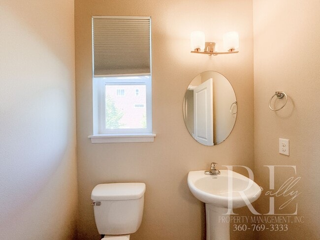 Building Photo - Modern End-Unit Townhome with Private Fenced Yard, Gourmet Kitchen & Spacious Layout