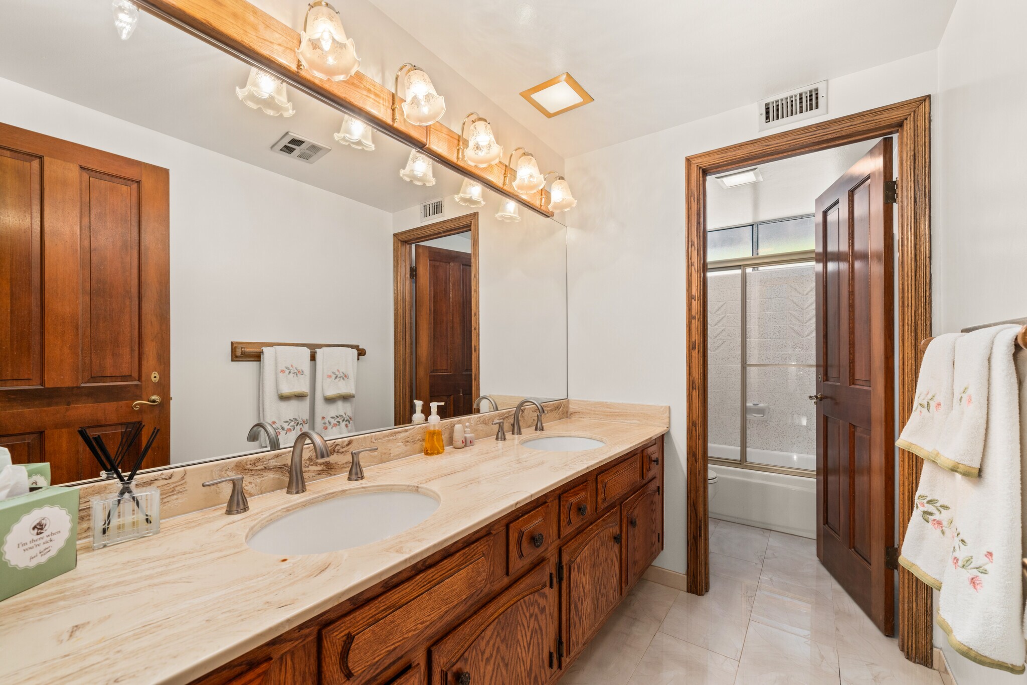 Full bathroom with marble floor - 1557 E Puente St