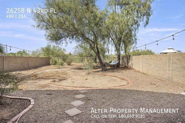 Building Photo - NEWER QUARTZ 4BR 2B