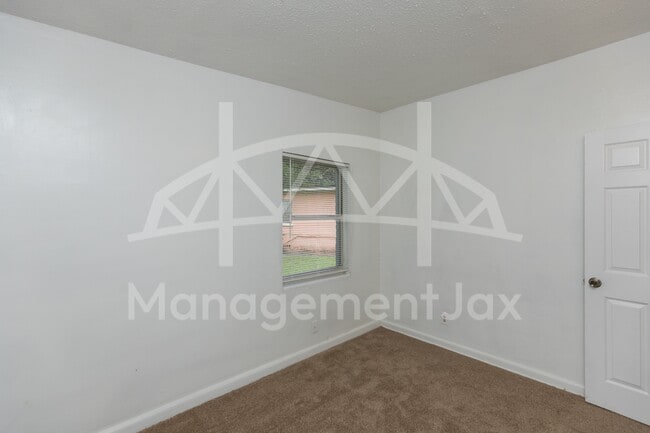 Building Photo - 5601 Pansy Ln
