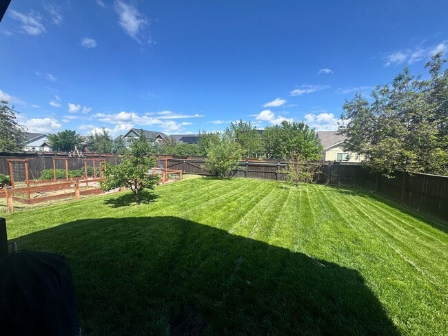 Building Photo - Large, Open Home with Beautiful Backyard and Oversized Garage