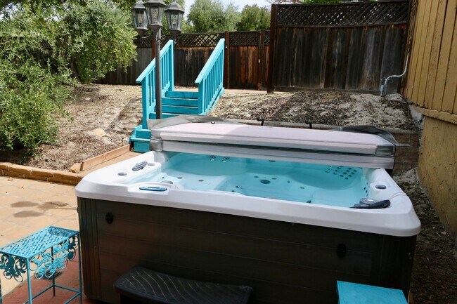 Building Photo - Garcia House: Fully Furnished, Wonderful Hot Tub, Spacious Fenced Outdoor Area, Pet-Friendly too!
