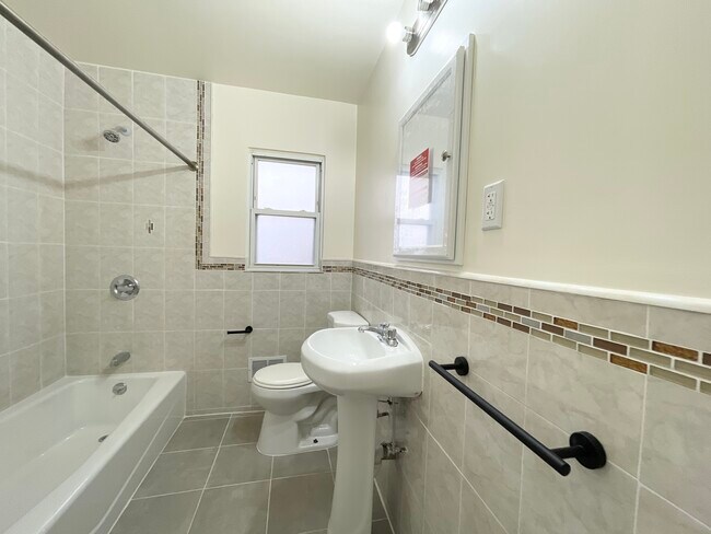Newly renovated bathroom 1 of 3 - 43-11 172nd Street