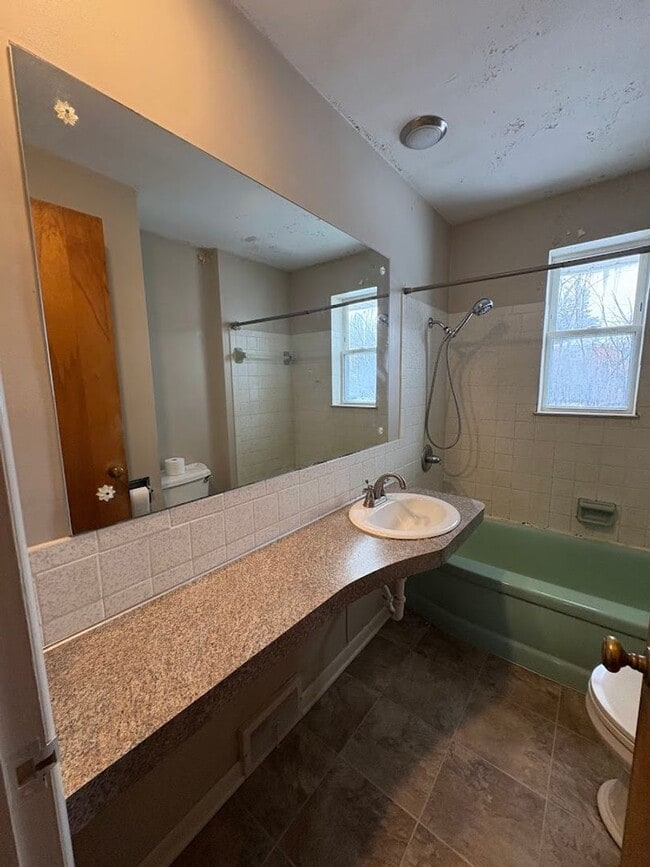 Building Photo - Three bedroom two bathroom single story home for rent