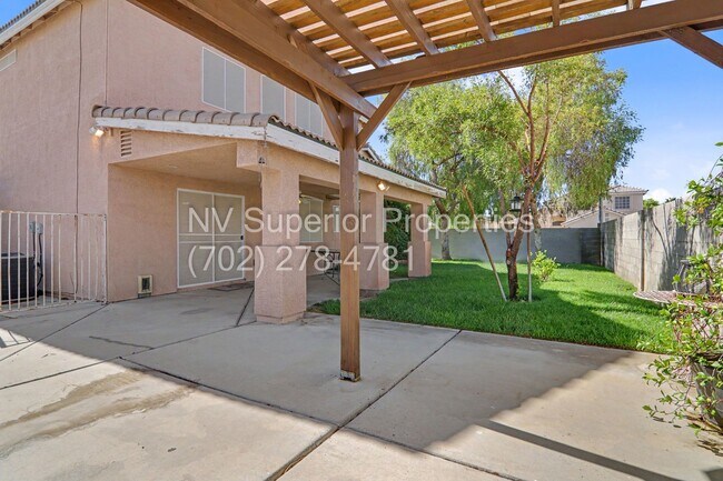 Building Photo - NW!! 4 bedrooms!! Bed & Bath DownStairs!!! RV Parking!!! Synthetic Grass Front yard!! Real Grass ...
