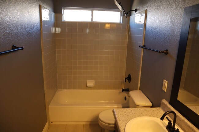 Building Photo - Home With A Pool and Much More!