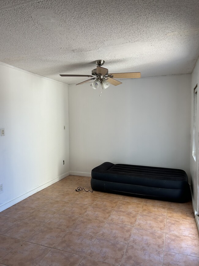 Garage living room area - 18200 Adams Cir