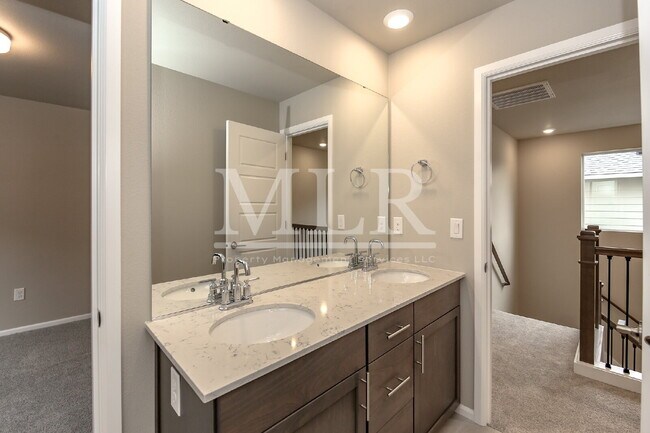 Building Photo - Elegant 4BR Covington Rental with Chef’s K...
