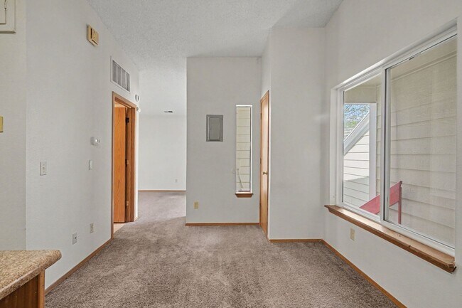 Building Photo - Charming Top-Floor Studio in Aurora with Private Patio & In-Unit Laundry