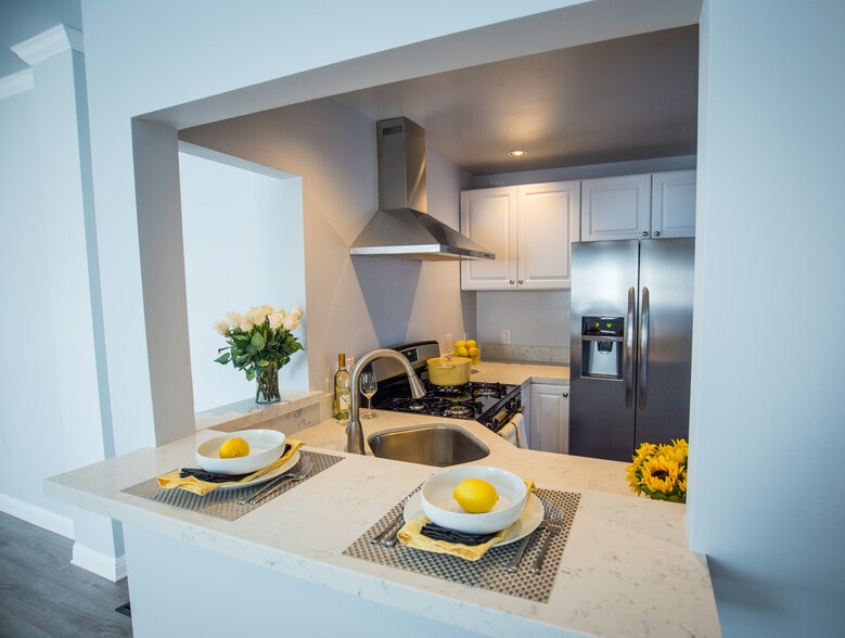Bar between kitchen and living. - 652 N Marengo Avenue