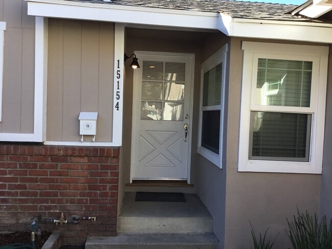 Front covered porch - 15154 Enadia Way