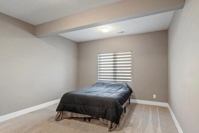 Building Photo - Waterfront Home in Buccaneer Bay with 3-Car Garage & Walkout Basement