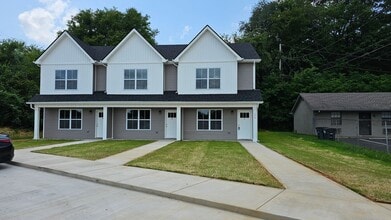 Building Photo - Built in 2024! Close to downtown 2 Bed/2.5 Bath. Nice private backyard with trees