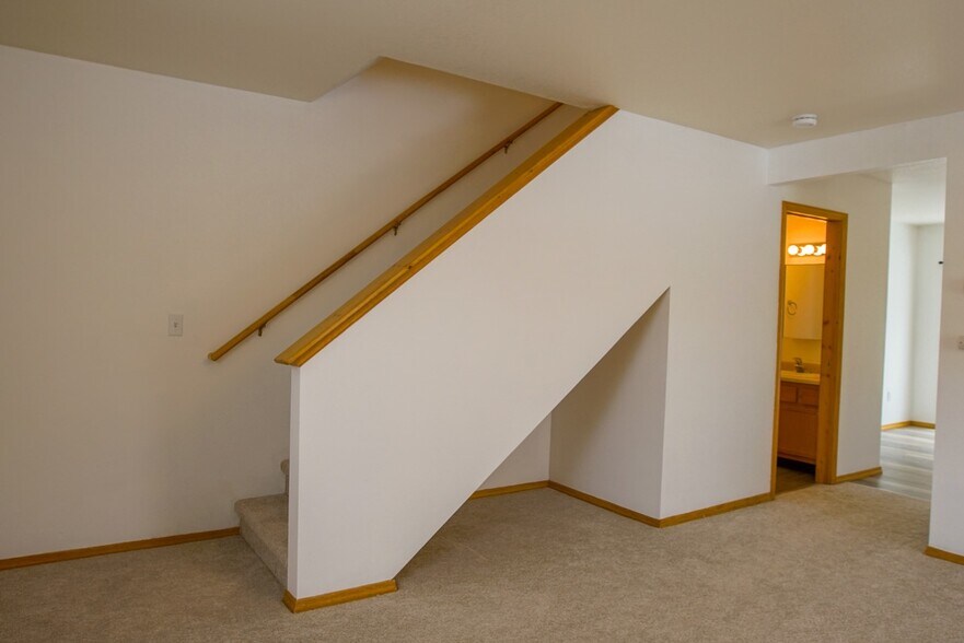 Front room with staircase - 414 W Babcock St, Unit 1