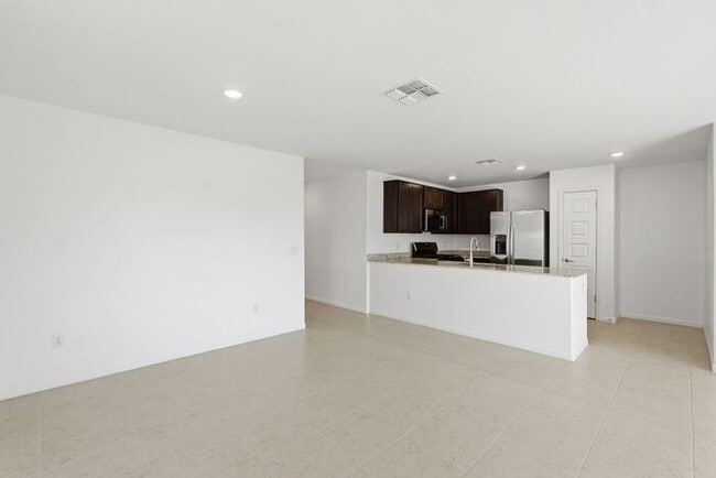 Building Photo - Modern Comfort Meets Desert Serenity – 4 Bed Rocking K Rental Home Available Now!
