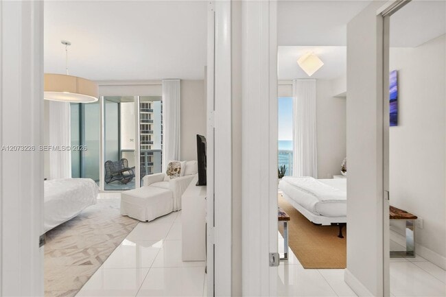 Building Photo - 15811 Collins Ave