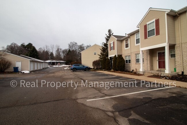 Building Photo - Forest Hills 3 Bed Townhome with Garage, Pond View and Some Utilities Included