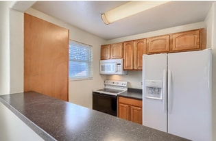 White microwave was replaced with a new black microwave - 4571 S Hannibal St