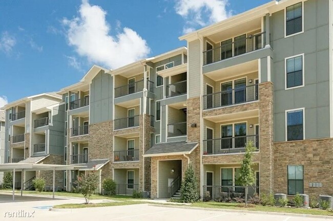 Building Photo - 1 br, 1 bath Condo - 7315 Spring Cypress R...