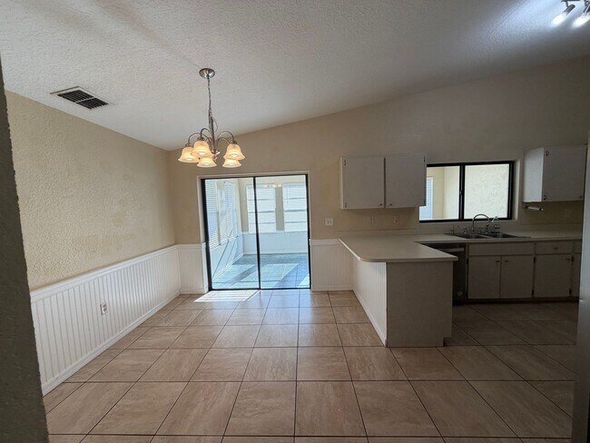 Building Photo - Spacious Open-Concept Home with Bonus Patio & Fenced Yard