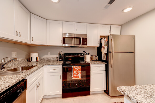 Kitchen sports excellent cabinet space! - 1124 25th St NW