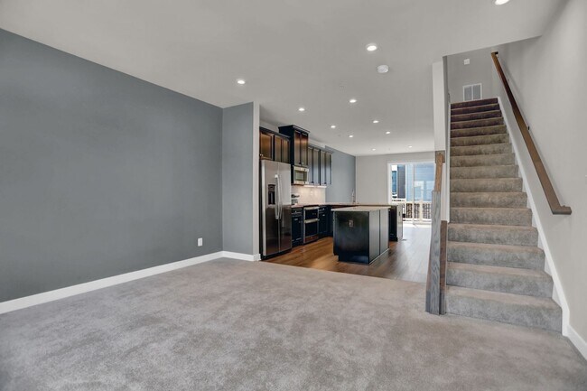 Building Photo - Luxury 4-Story Townhome with Rooftop Terrace!