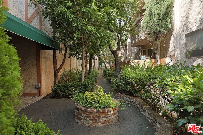 Condo complex courtyard - 12030 Rochester Ave