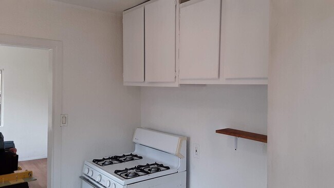 Kitchen Cabinets and Stove - 3214 Johnston St
