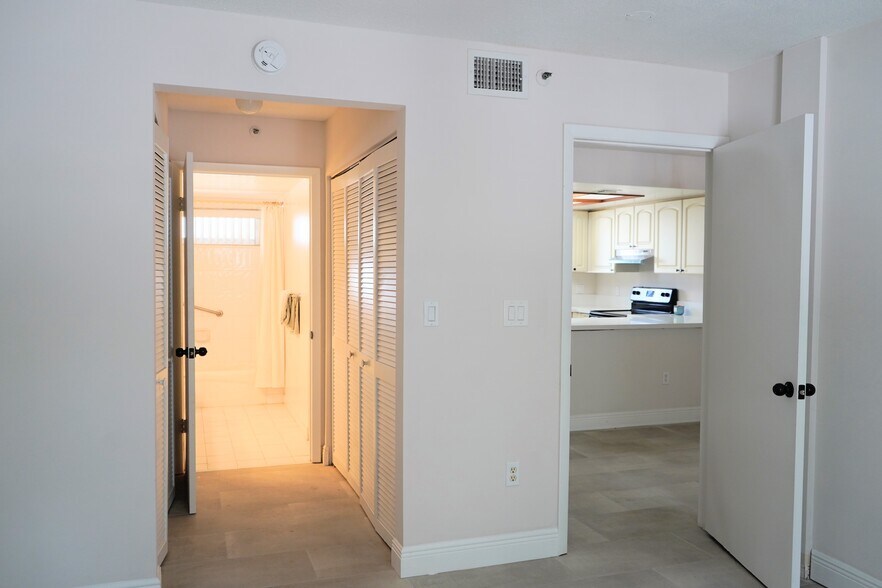 Primary Bedroom, Double wall closet and Primary Bathroom - 269 NW 7th St