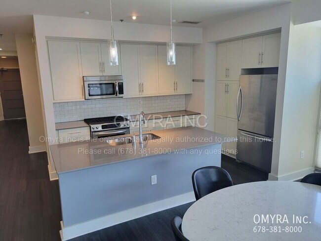Building Photo - Stunning 3-Bedroom Midtown Condo with City Views!