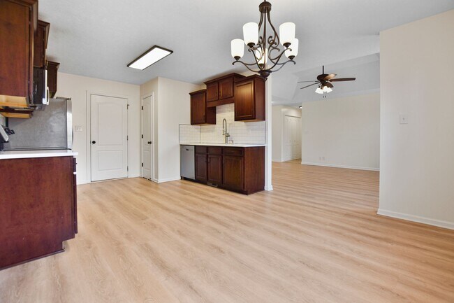 Building Photo - Pet Friendly Three Bedroom with Bonus!