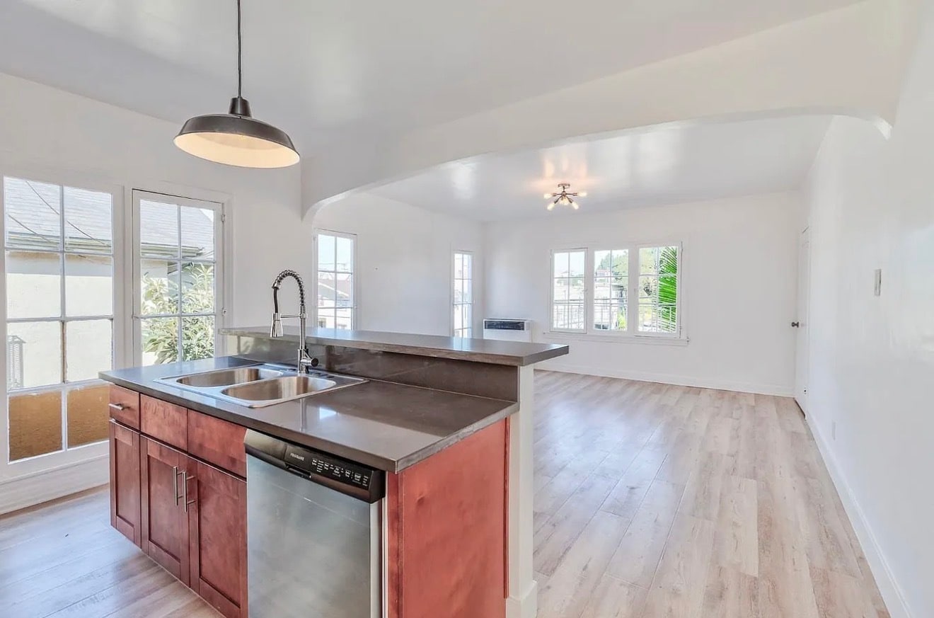 open concept with view from front door looking at the living room - 1704 Miramar St