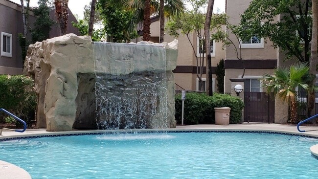 Building Photo - Spanish Palms a Guard Gated Community