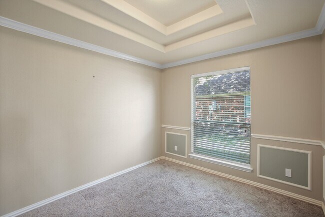 Building Photo - Gorgeous 4/2 Home in the Villages of Edgewater Estates with Soaring Ceilings and 2 Flex Rooms!