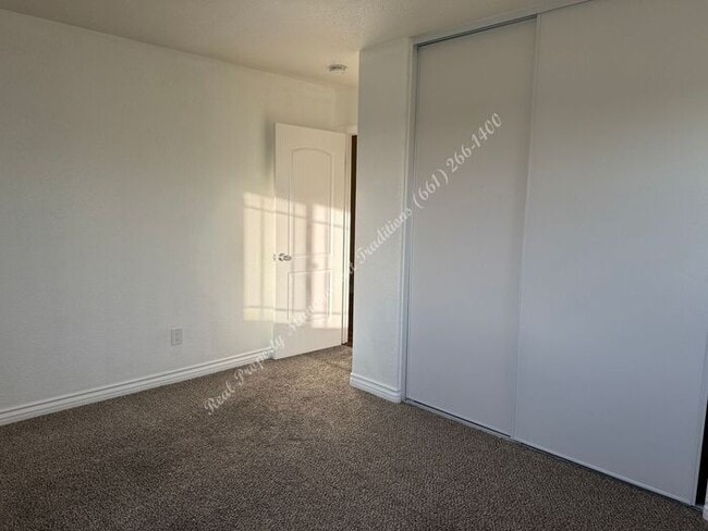 Building Photo - New Year Special! 50% Off First Months Rent!