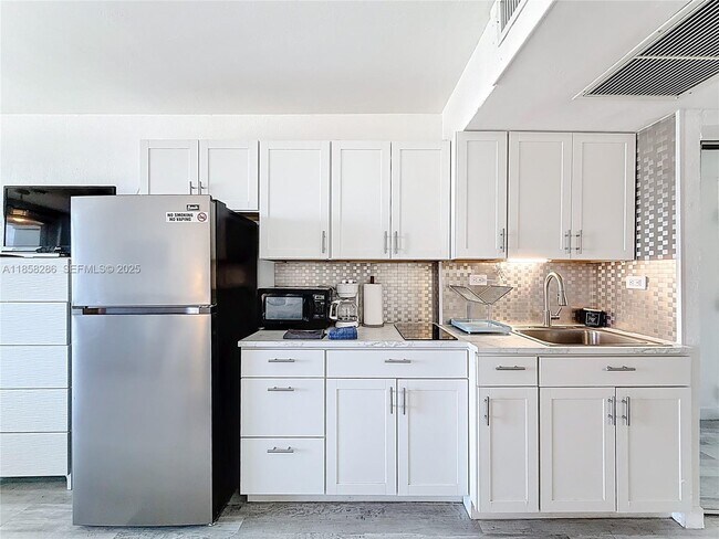 Building Photo - 19201 Collins Ave