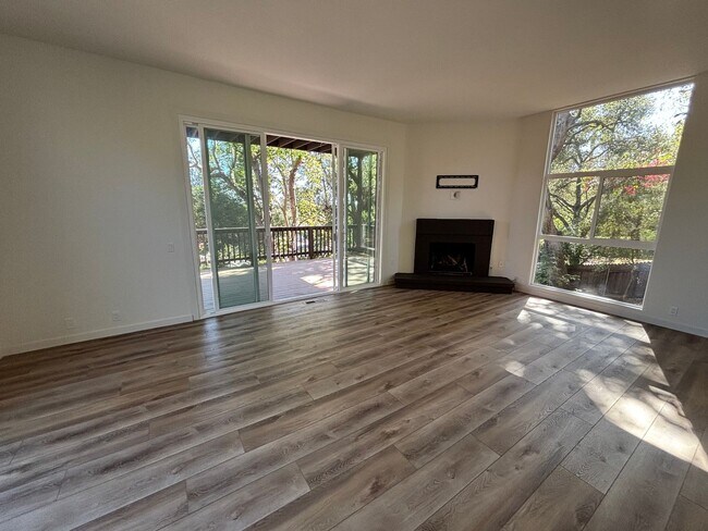 Building Photo - Updated Mission Canyon Retreat — 3BD/2.5BA with Views, Decks & Soaring Ceilings