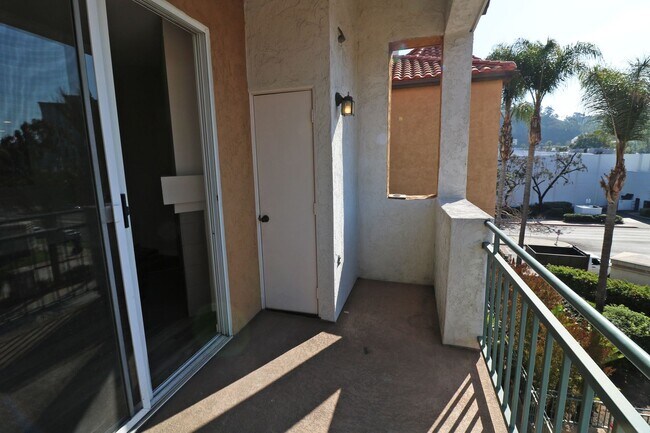 Building Photo - Mission Valley condo (River Colony) with balcony!  Central heat/ air. Gated garage parking. Pool/...