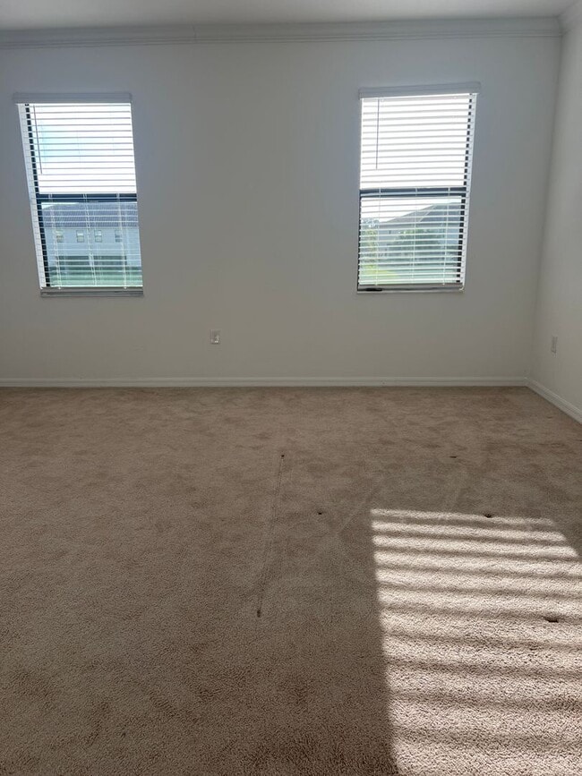 Building Photo - 3BR/2.5BA/1CG Townhome in Gran Paradiso