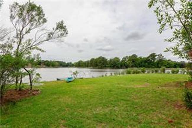 Building Photo - 4 BED/3 BATH LOCATED IN A WATERFRONT COMMU...