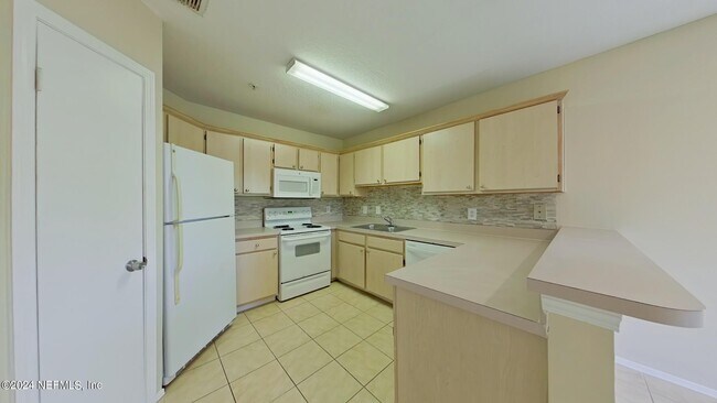 Building Photo - 1701 The Greens Way