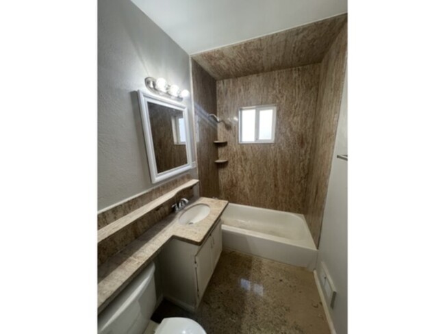 Building Photo - SECTION 8 WELCOME!! Three bedroom two bath...