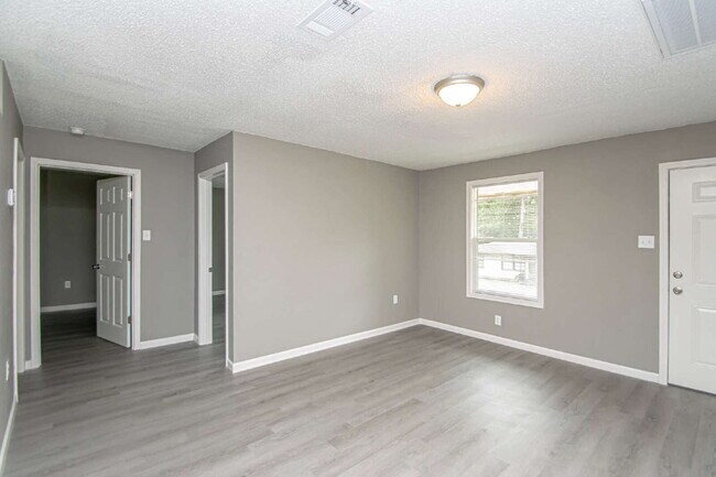 Building Photo - For Rent: Spacious Studio with 2 Baths in ...