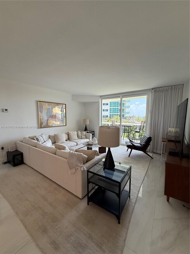 Building Photo - 10275 Collins Ave