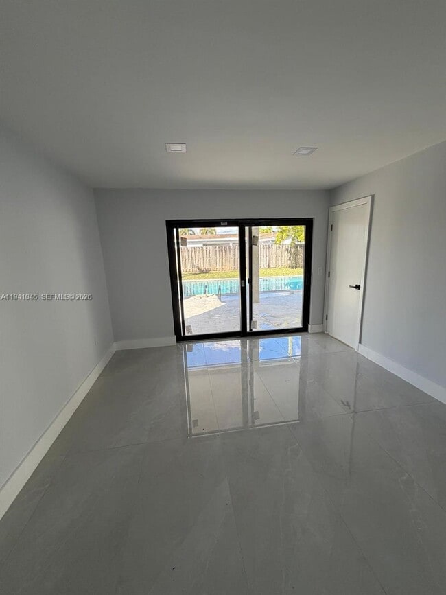 Building Photo - 10581 NW 28th Manor