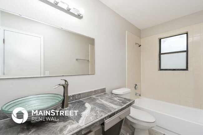 Building Photo - 7969 Sweet Rose Ln E